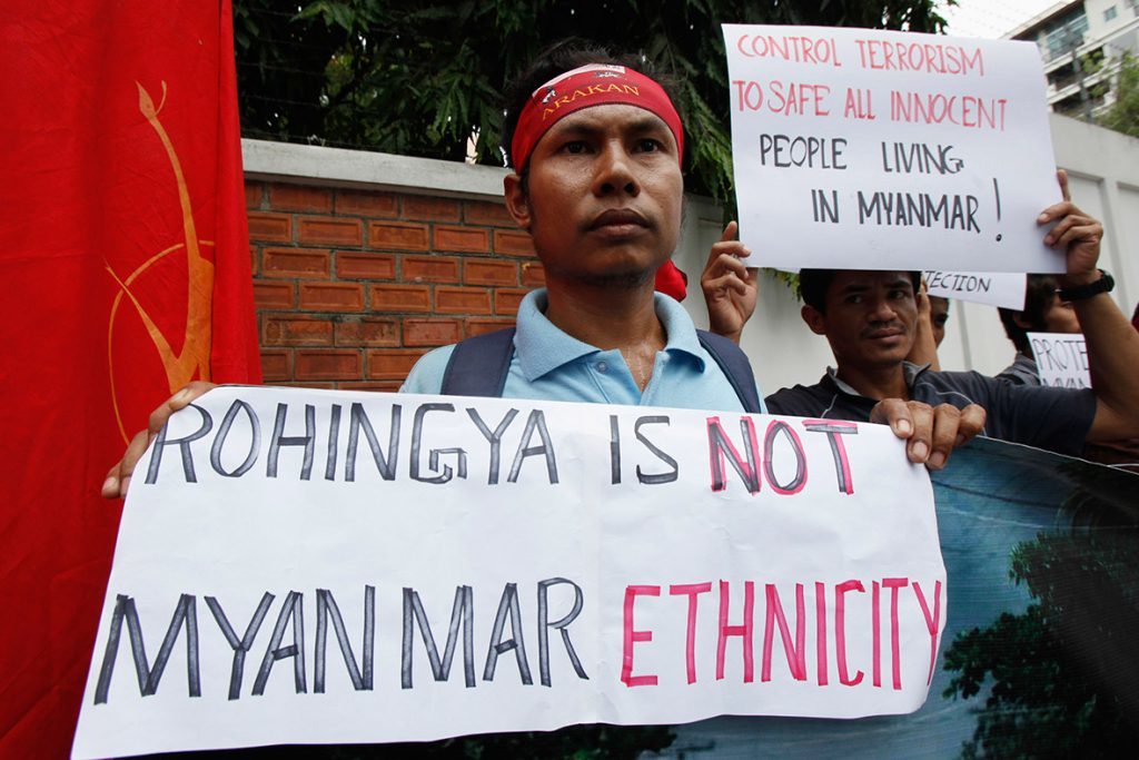 Protesters with the Banner "Rohingya is not Myanmar Ethnicity"