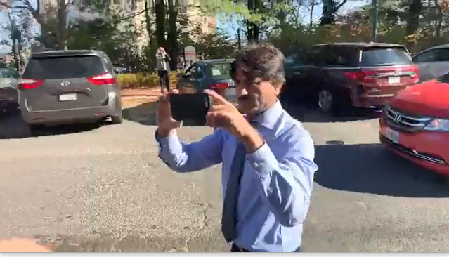 Pakistan Intelligence Agency ISI Officer making video of all the protesters present during Protests in Washington DC in order to identify the protesters and implicate their relatives in Fake cases in Pakistan.