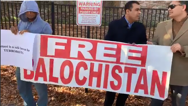 Senge Hasnan Sering holding the banner for Free Balochistan during Protests in Washington DC